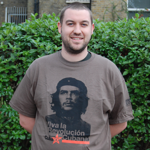 X T-Shirt: Che Guevara Viva la revolucion cubana - Cuba50 - black and orange on olive